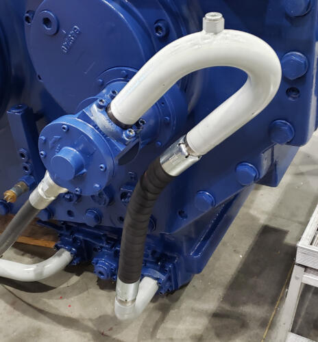 Hose assembly fitted to gearbox.